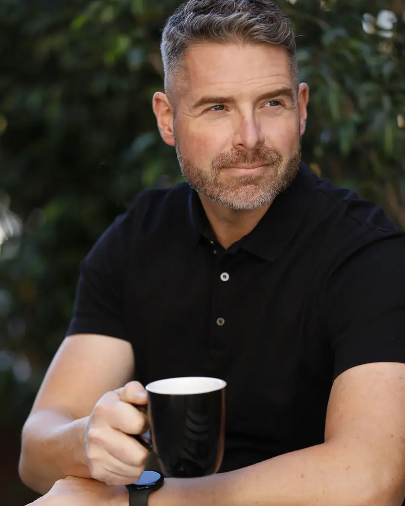 Nick Willitts, founder of nelpa, at an outdoor cafe table in Perth